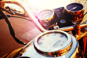 fragment,of,old,fashioned,motorcycle,with,handlebar,and,dashboard,in